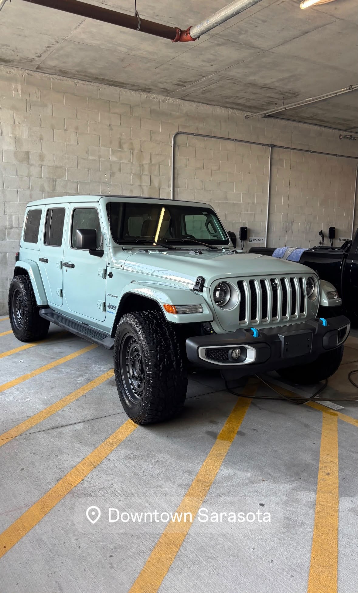 Sage green Jeep Wrangler Unlimited detailed